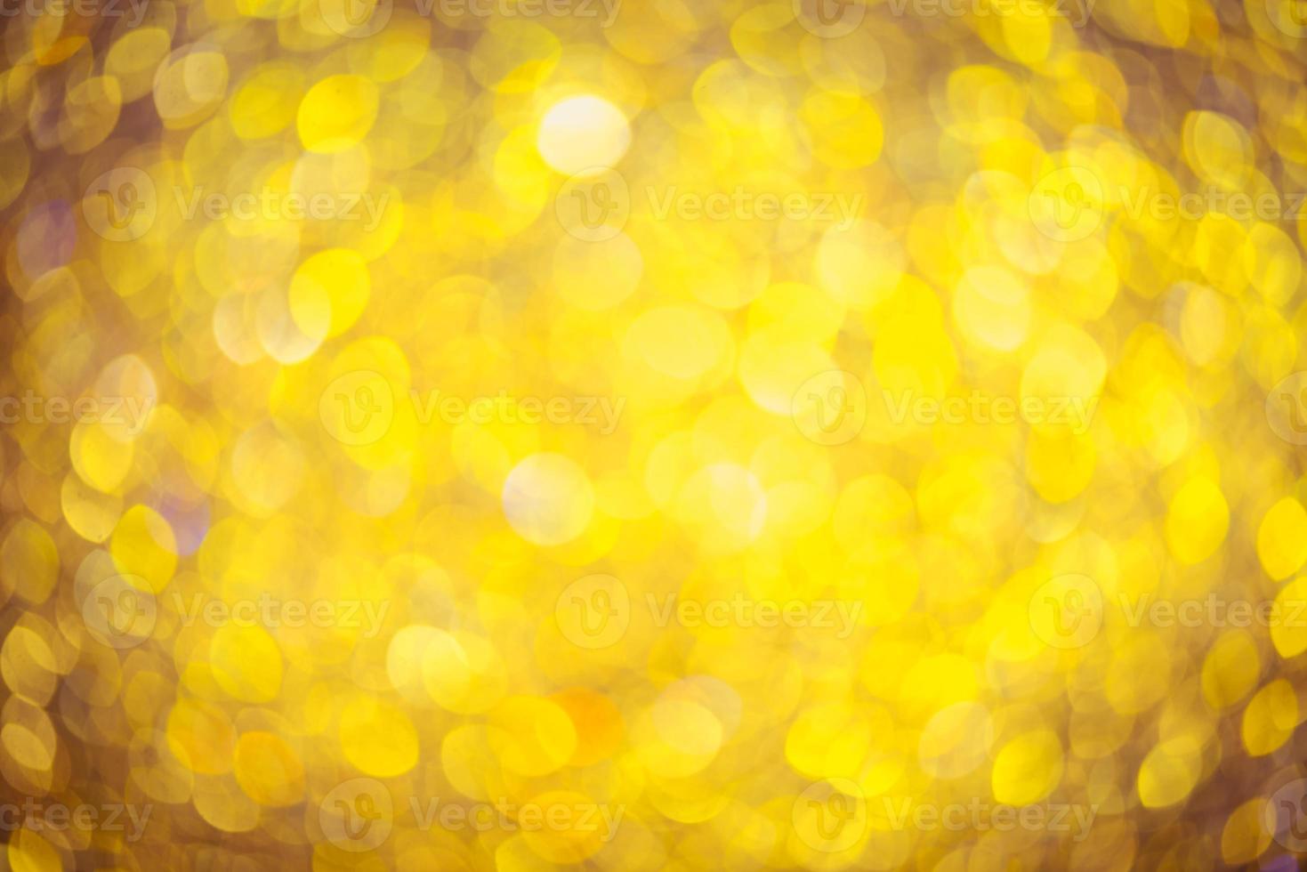 Golden glitter bokeh lighting texture Blurred abstract background for birthday, anniversary, wedding, new year eve or Christmas photo
