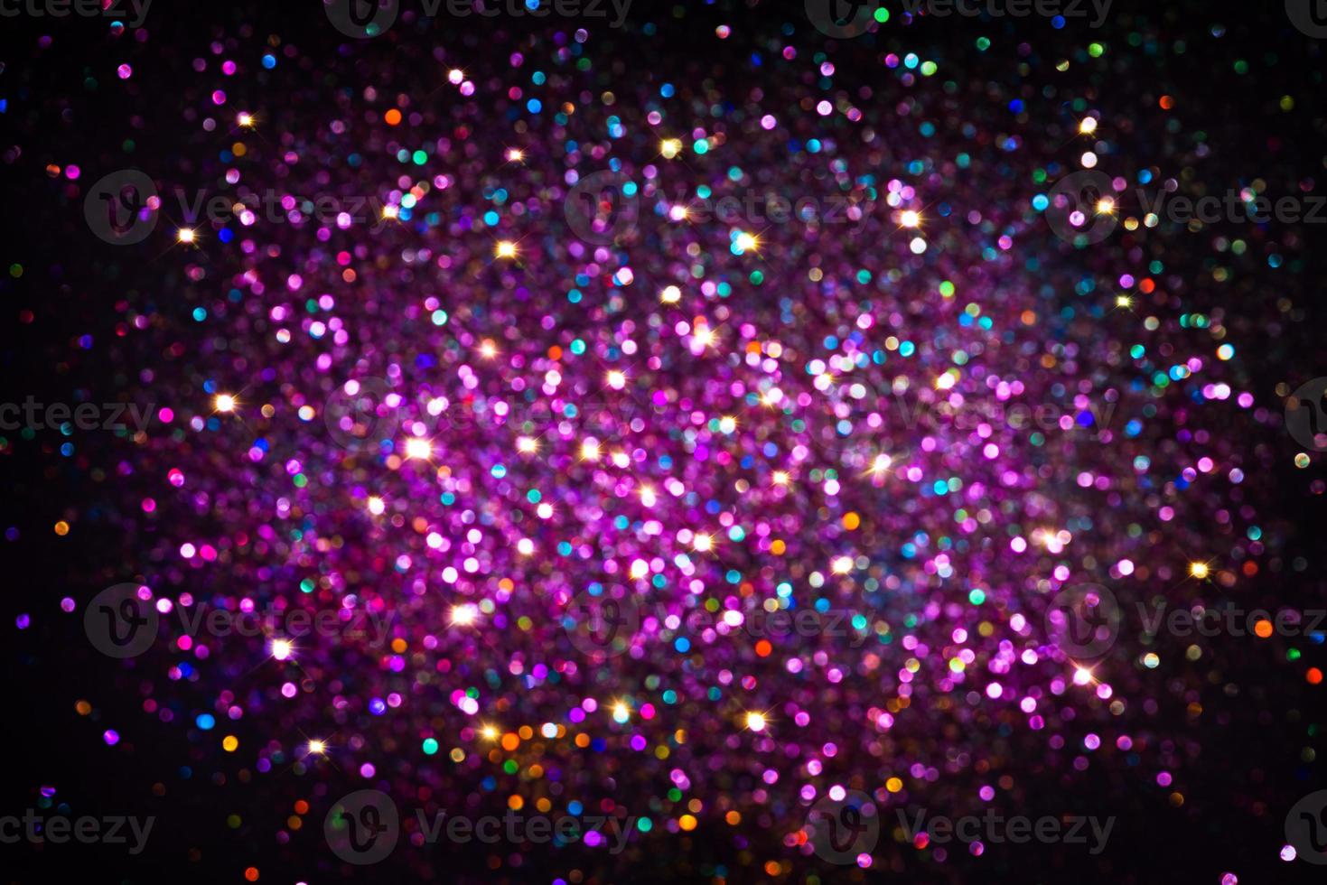 bokeh effect glitter colorful blurred abstract background for birthday, anniversary, wedding, new year eve or Christmas photo