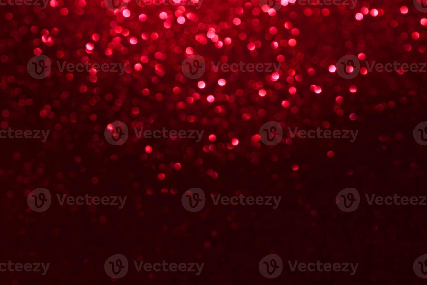 red glitter bokeh lights Blurred abstract background for Valentines, birthday, anniversary, wedding, new year and Christmas photo