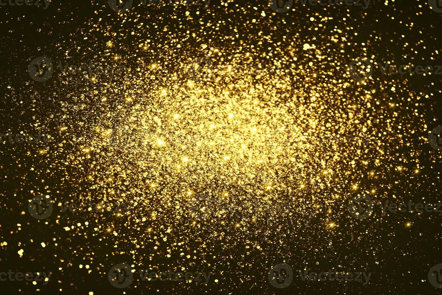 Golden glitter bokeh lighting texture Blurred abstract background for birthday, anniversary, wedding, new year eve or Christmas photo