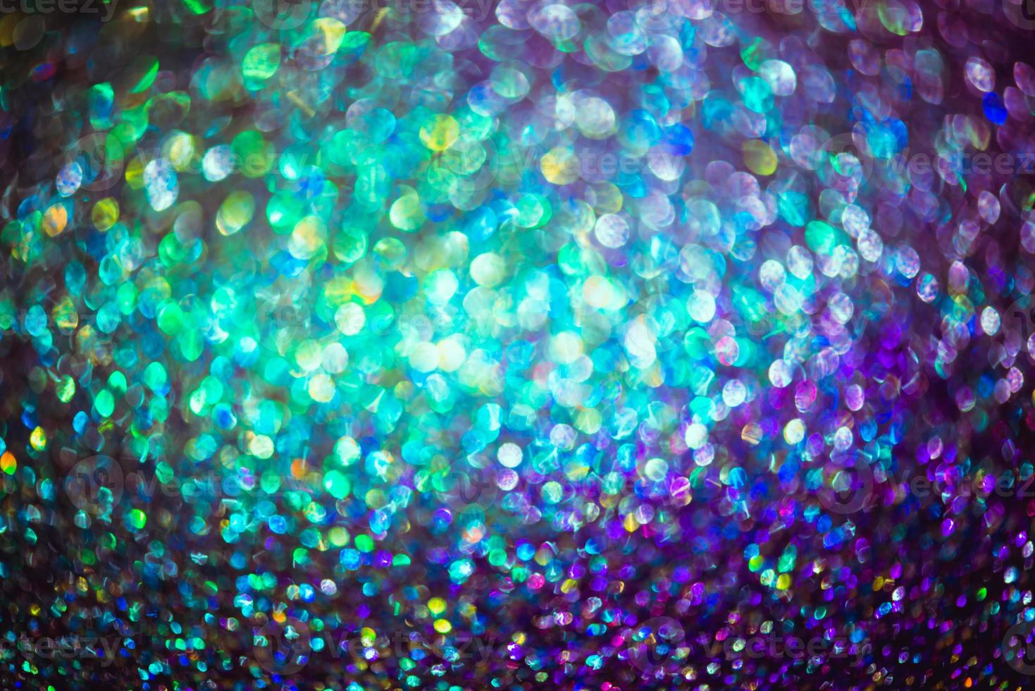 bokeh effect glitter colorful blurred abstract background for birthday, anniversary, wedding, new year eve or Christmas photo