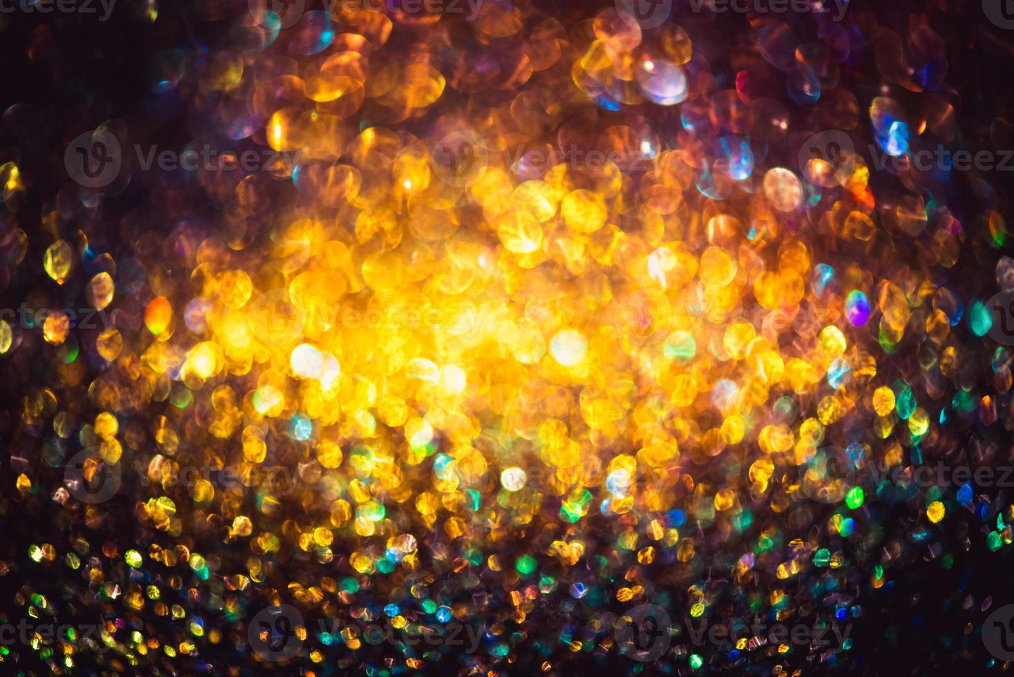 bokeh effect glitter colorful blurred abstract background for birthday, anniversary, wedding, new year eve or Christmas photo