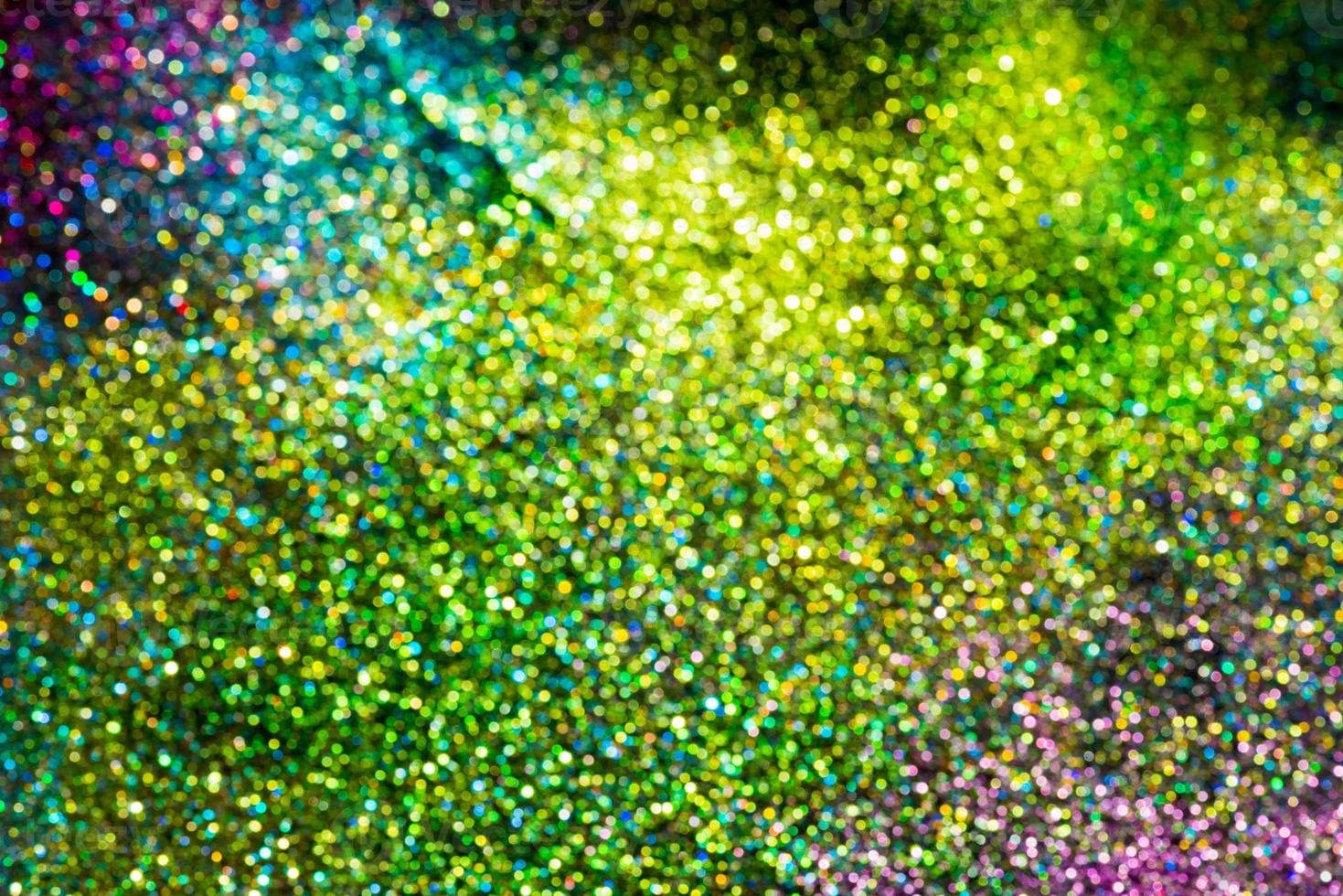 bokeh effect glitter colorful blurred abstract background for birthday, anniversary, wedding, new year eve or Christmas photo