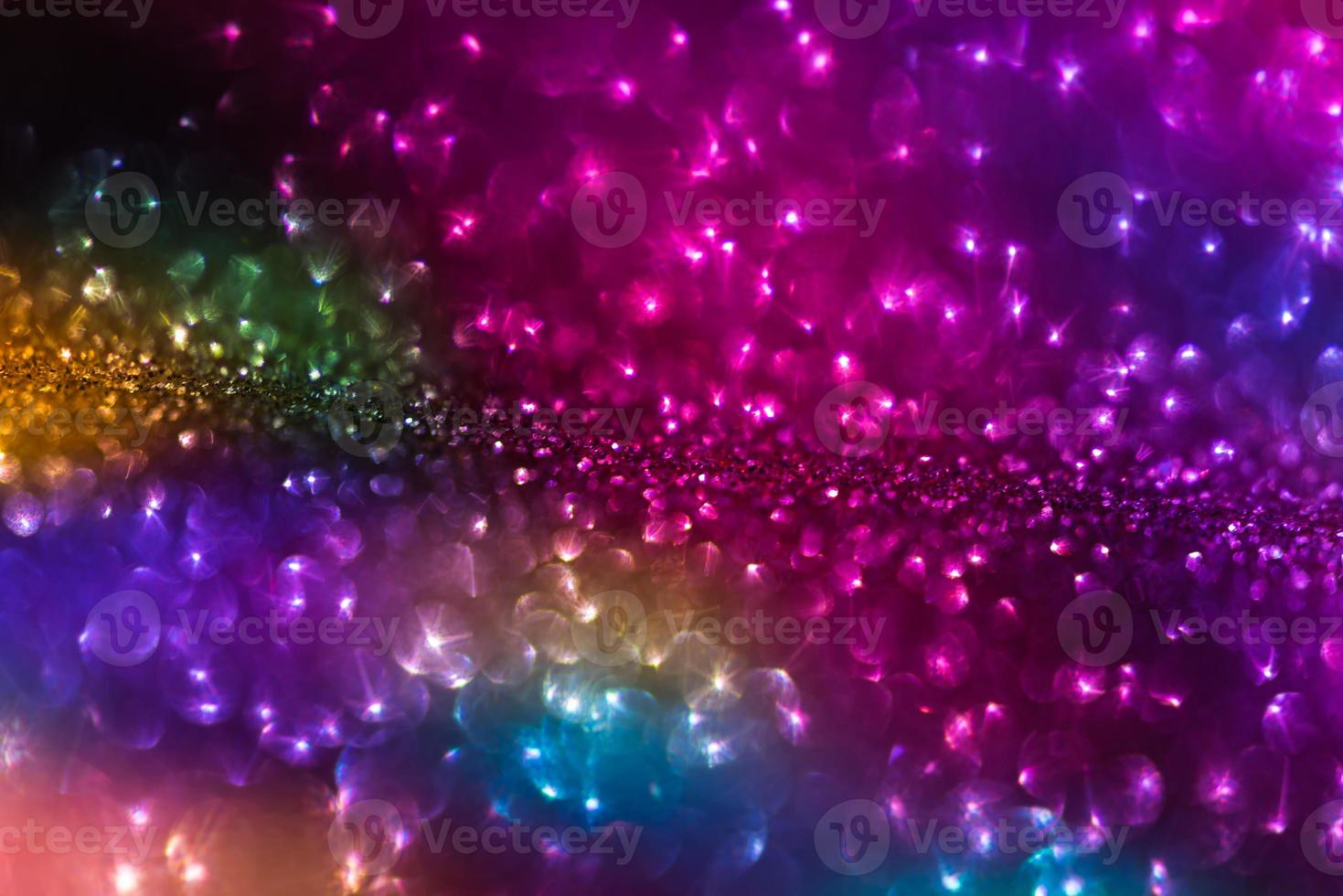 bokeh effect glitter colorful blurred abstract background for birthday, anniversary, wedding, new year eve or Christmas photo