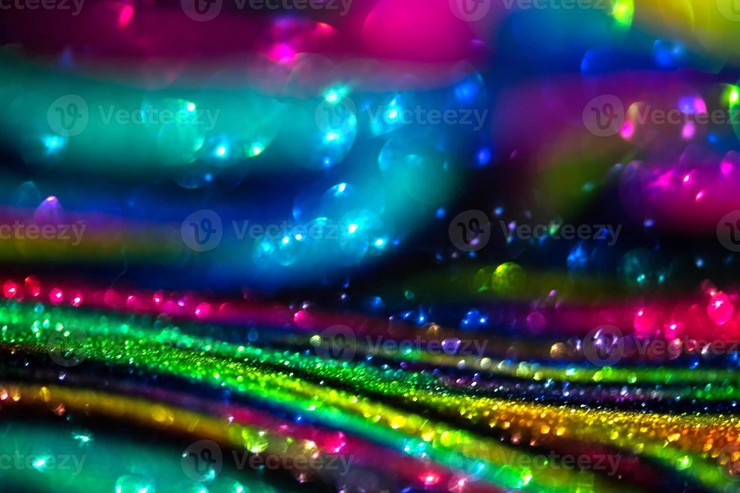 bokeh effect glitter colorful blurred abstract background for birthday, anniversary, wedding, new year eve or Christmas photo