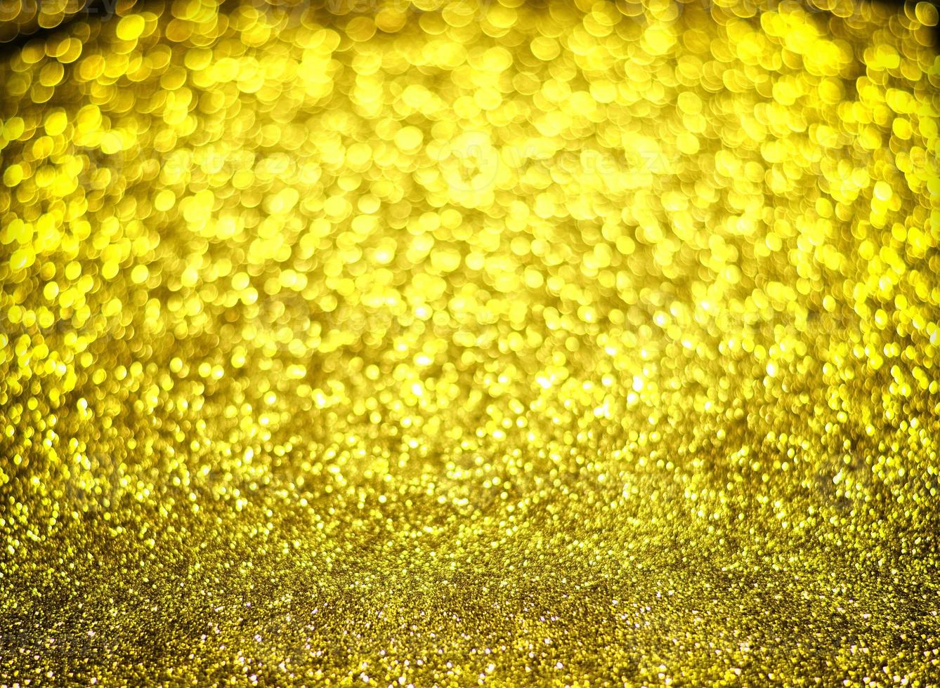 Golden glitter bokeh lighting texture Blurred abstract background for birthday, anniversary, wedding, new year eve or Christmas photo