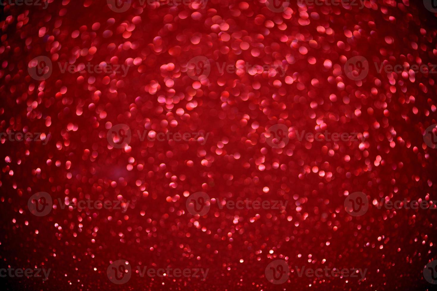 red glitter bokeh lights Blurred abstract background for Valentines, birthday, anniversary, wedding, new year and Christmas photo