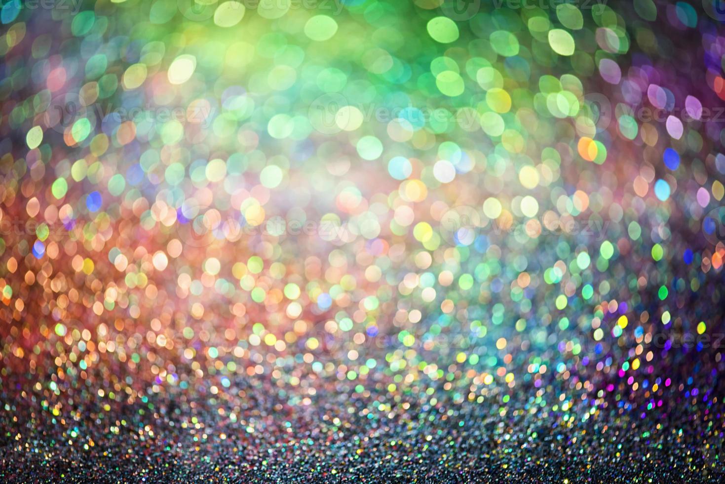 bokeh effect glitter colorful blurred abstract background for birthday, anniversary, wedding, new year eve or Christmas photo