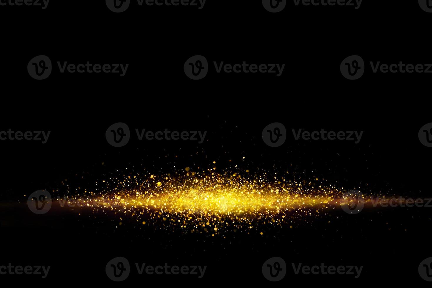 Golden glitter spatter are bokeh lighting texture blurred abstract background for anniversary celebration photo