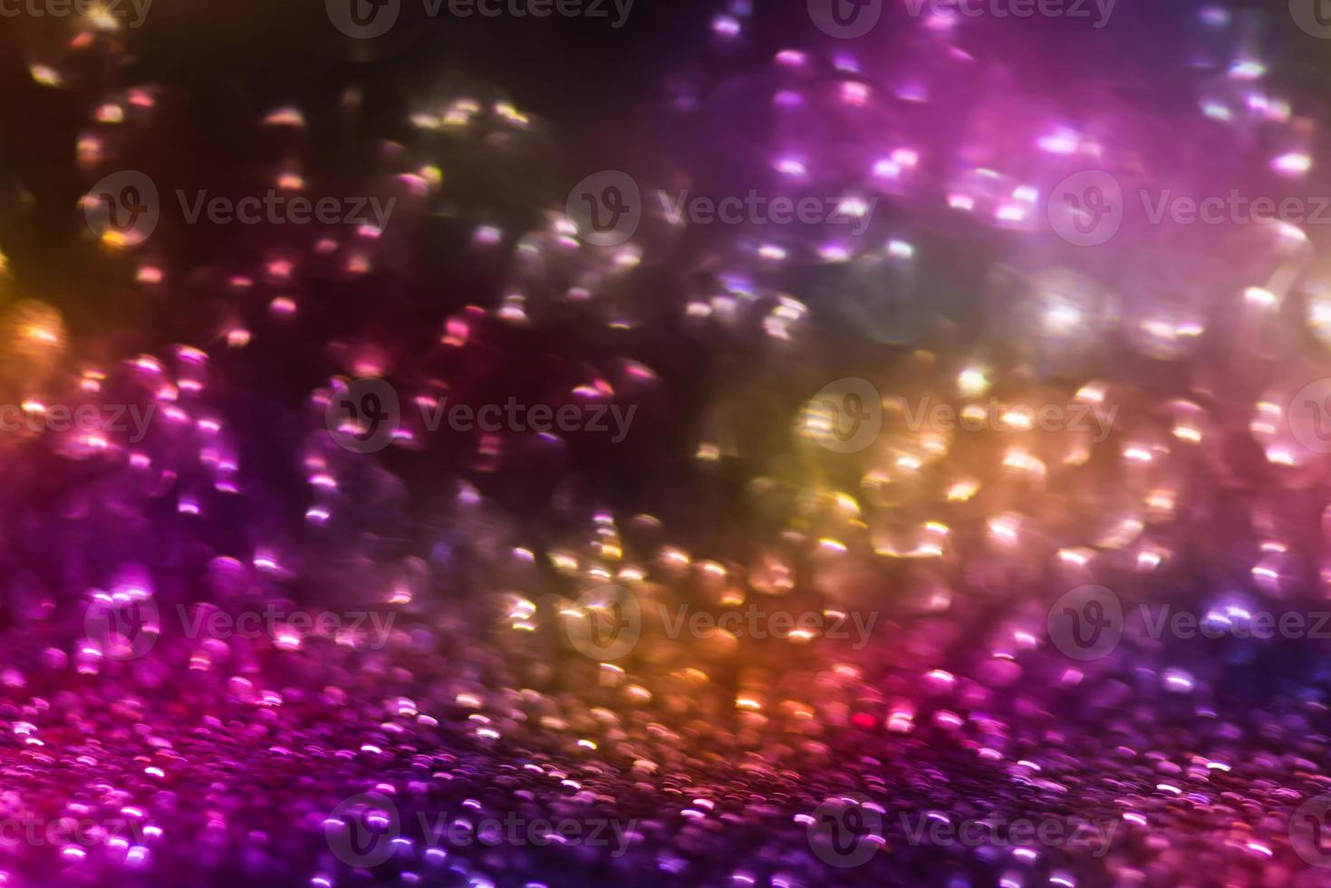 bokeh effect glitter colorful blurred abstract background for birthday, anniversary, wedding, new year eve or Christmas photo