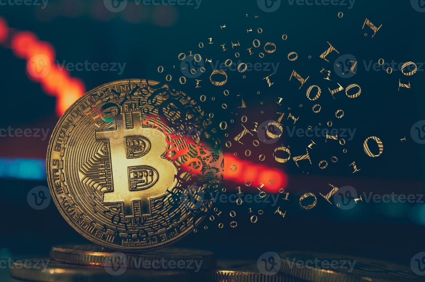 Crypto currency golden coin. Gold bitcoin falling apart. Concept of a cryptocurrency market crisis and defocused chart background photo