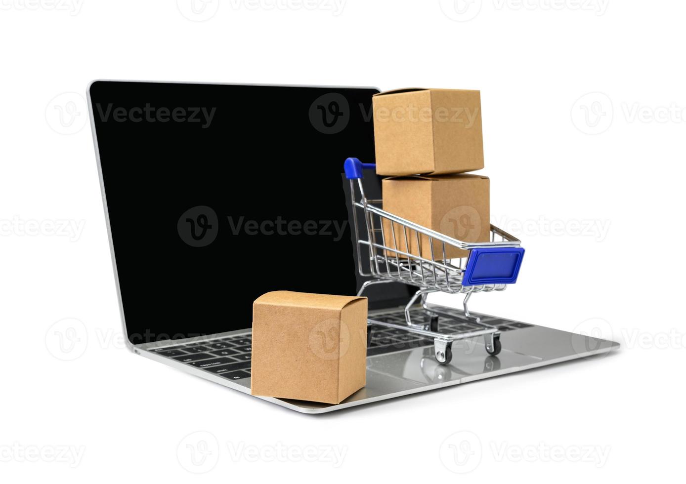 Boxes in a trolley on white background with clipping path. Concepts about online shopping photo