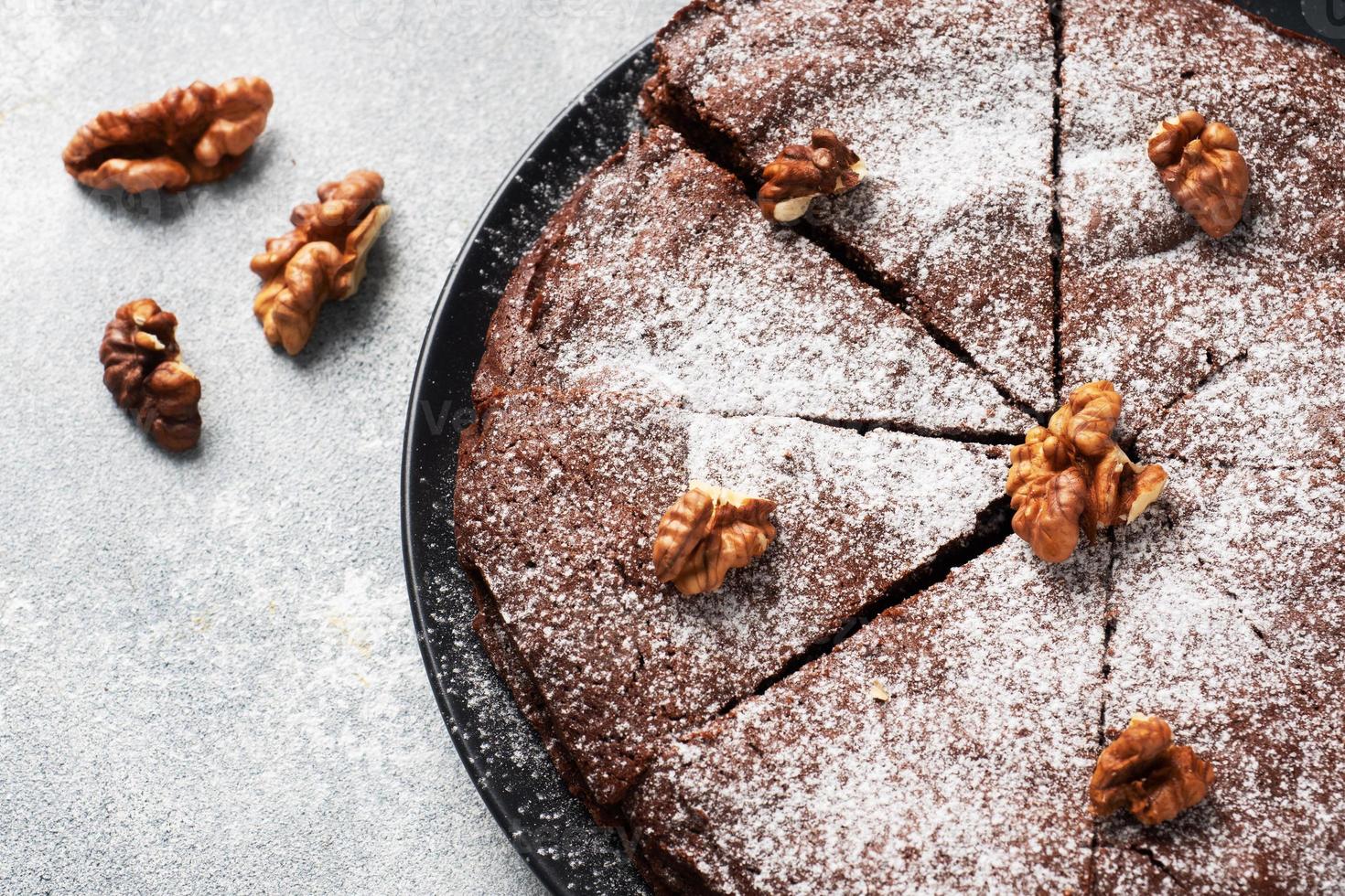 Homemade chocolate brownie with walnuts. Baking chocolate cake. copy space photo