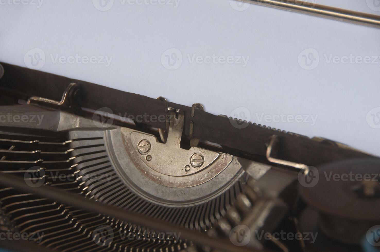 Selective view of an old typewriter in vintage color. photo