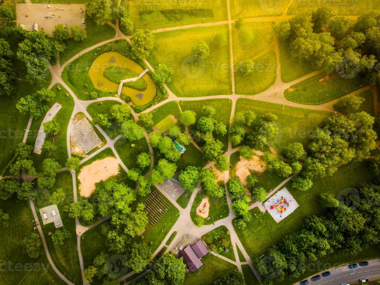 Aerial top view Public park in south part of Siauliai city with people enjoying leisure activities, Lithuania photo