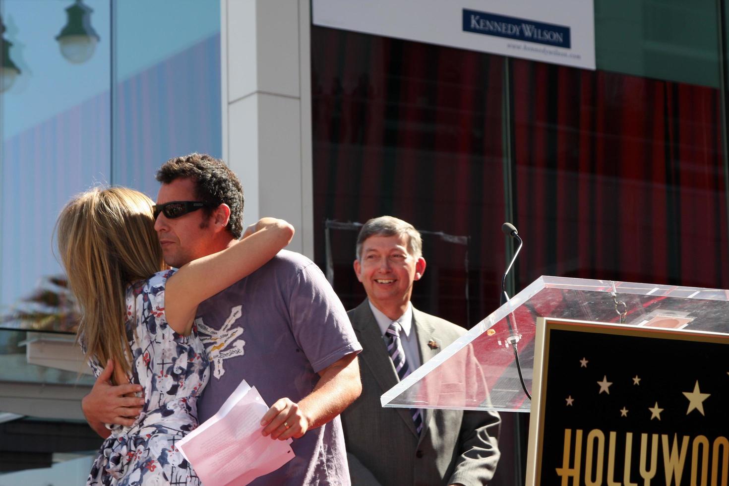 LOS ANGELES, FEB 22 -  Jennifer Aniston, Adam Sandler at the Jennifer Aniston Hollywood Walk of Fame Star Ceremony at the W Hollywood on February 22, 2012 in Los Angeles, CA photo