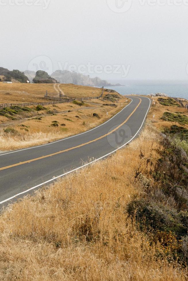 Road on a foggy day photo