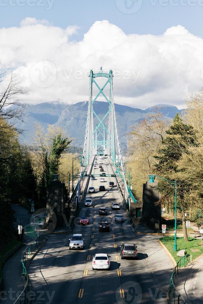 Cars driving on a bridge photo