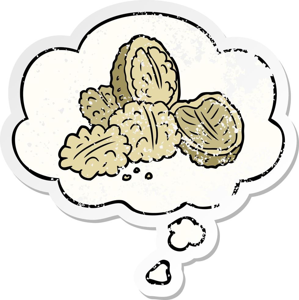 cartoon walnuts and thought bubble as a distressed worn sticker vector