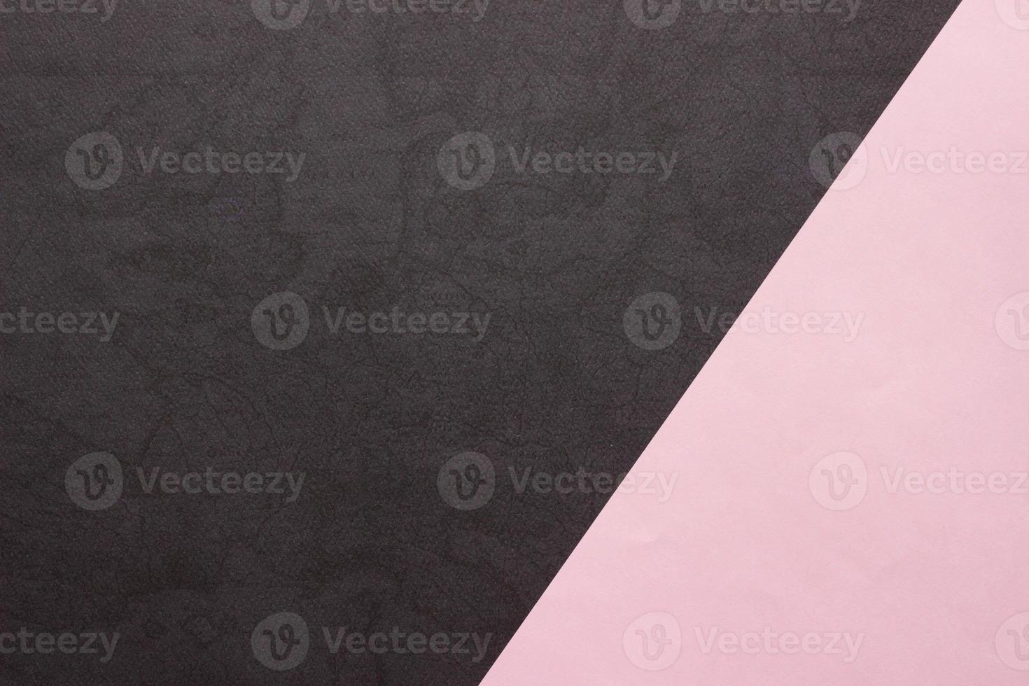 Pink and textured black paper background. Abstract banner, poster with place for text. Minimalism photo