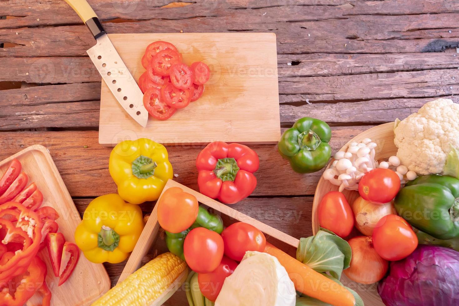 Top view tomato sliced on cutting board photo