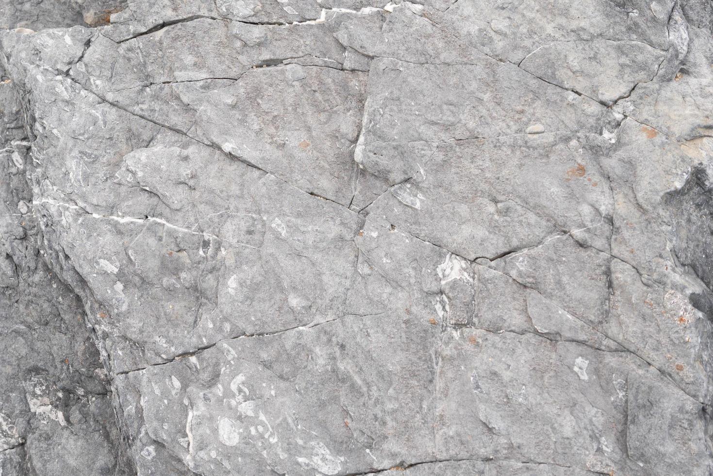 Gray stone with a fracture and broken line photo