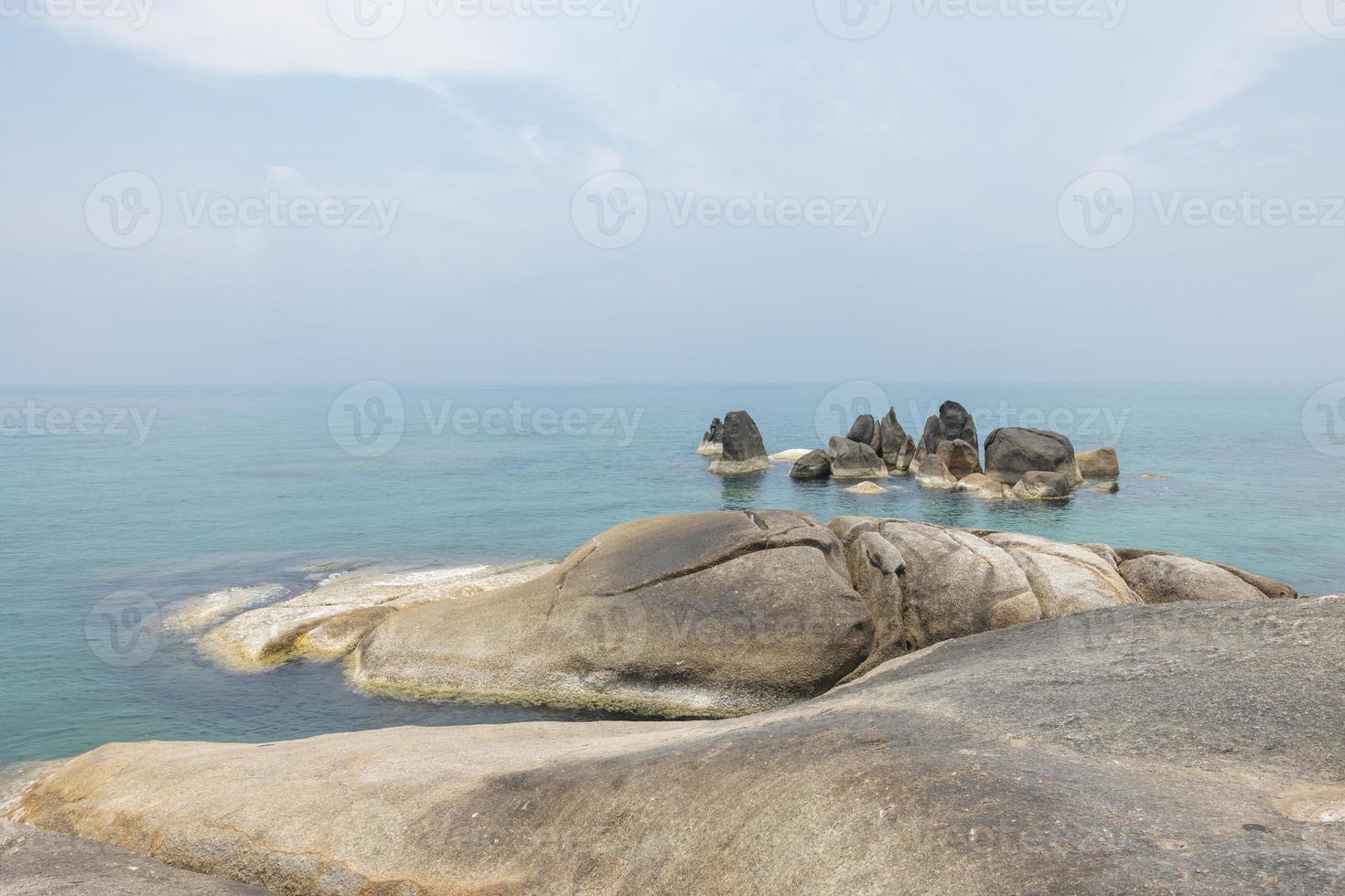 Sea landscape with rocks in the foreground and sky in the background. Therapeutic natural scenery gives a feeling of relaxation. At Koh Samui, Surat Thani Province, Thailand photo