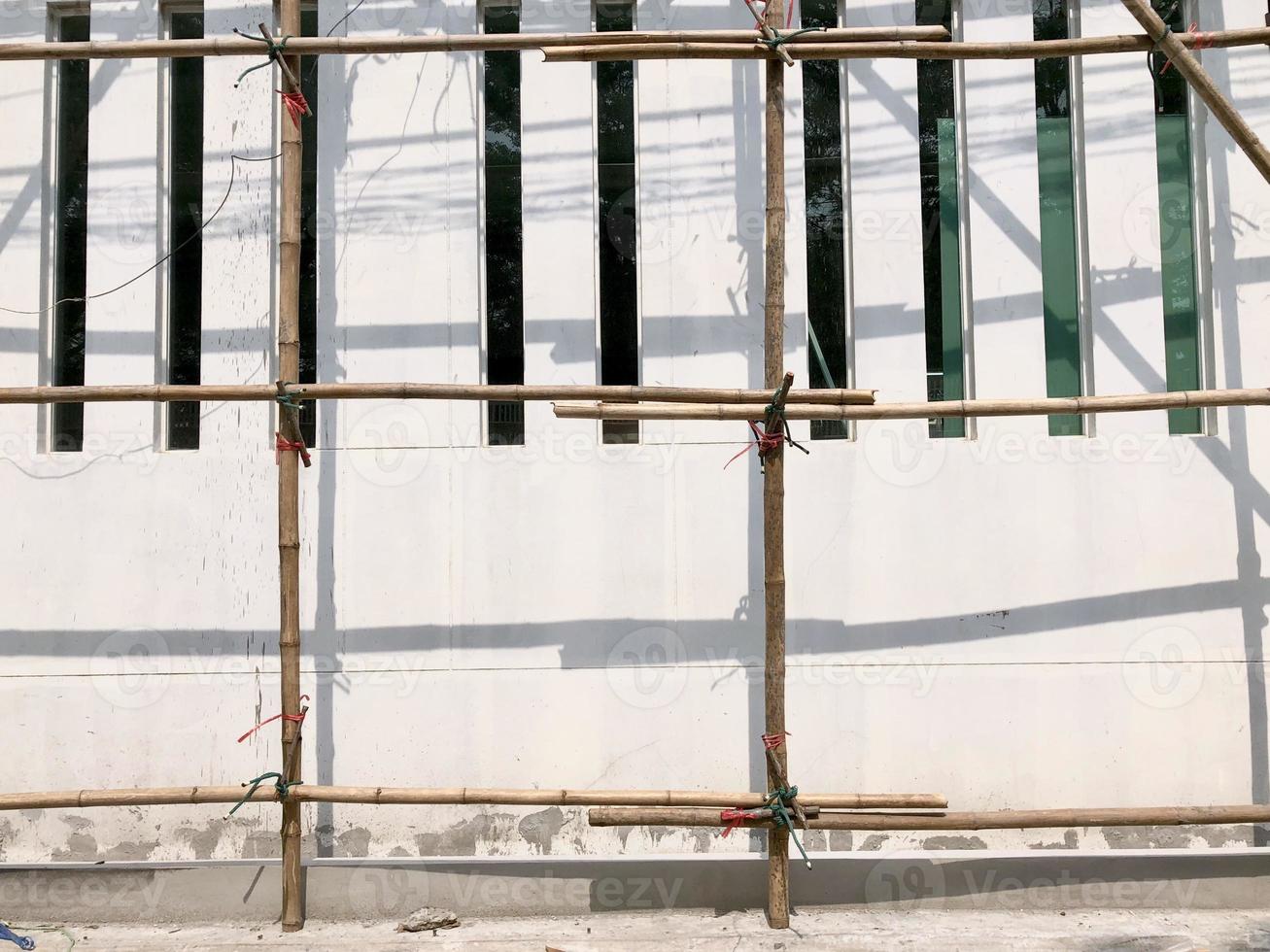 bamboo sticks are tile together to be base on painter photo