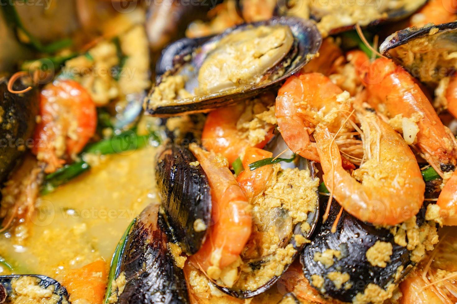Curry shrimp and Mussel in the international line buffet. photo
