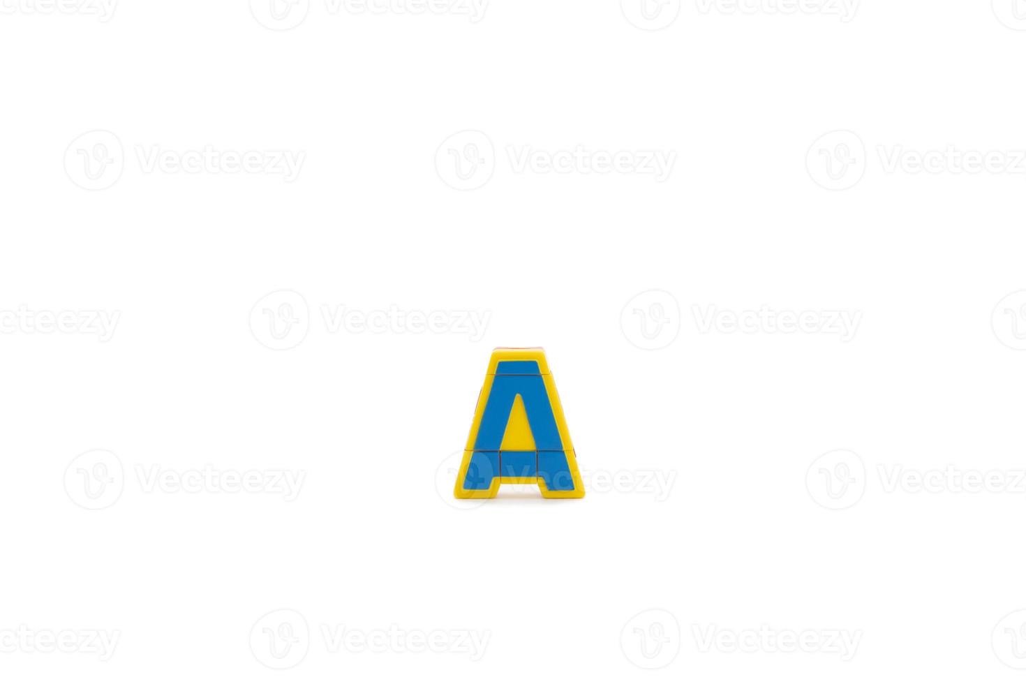 A Alphabet vintage toy, the robotic transformation model is standed and isolated in studio light. Clipping Path. photo