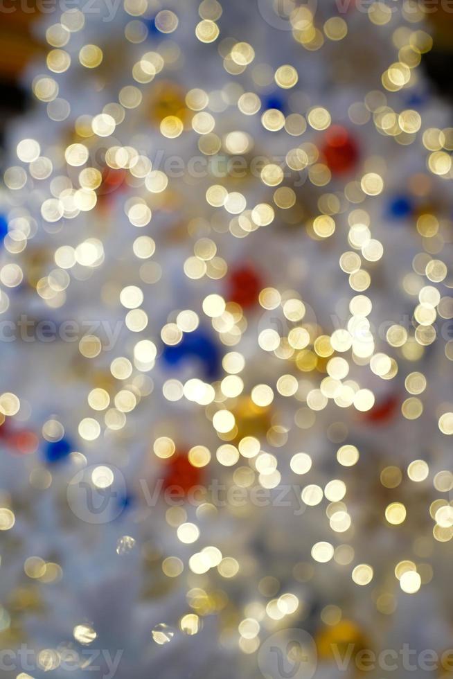 Colourful Beautiful Blurry circle bokeh, out of focus background in the Christmas concept and theme. photo