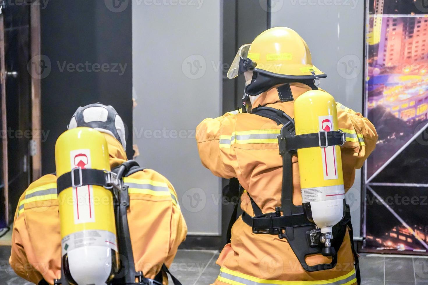 Fireman on duty with their yellow uniform. photo