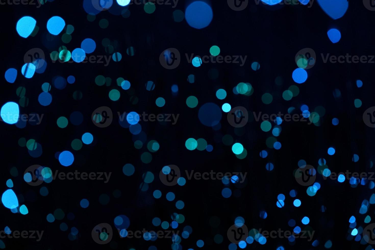 Fantastic blurry and bokeh dark blue theme background in the mystry cave. photo