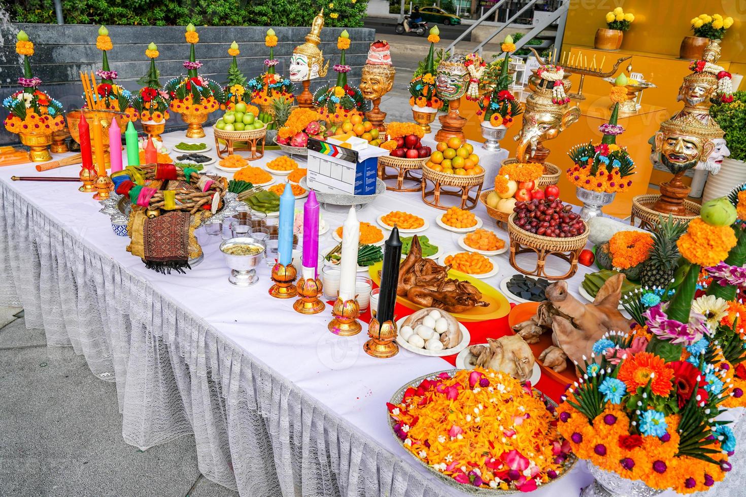 The Sacrifice objects set for the Thai filming project. They prepare in front of the spiritual landlord statue and asking for the successful project. photo