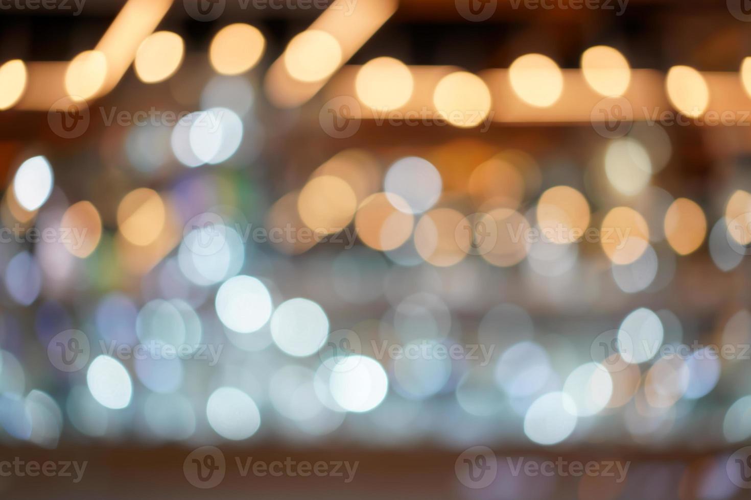Blurry and bokeh background with the white, silver, platinum, gold color theme. photo