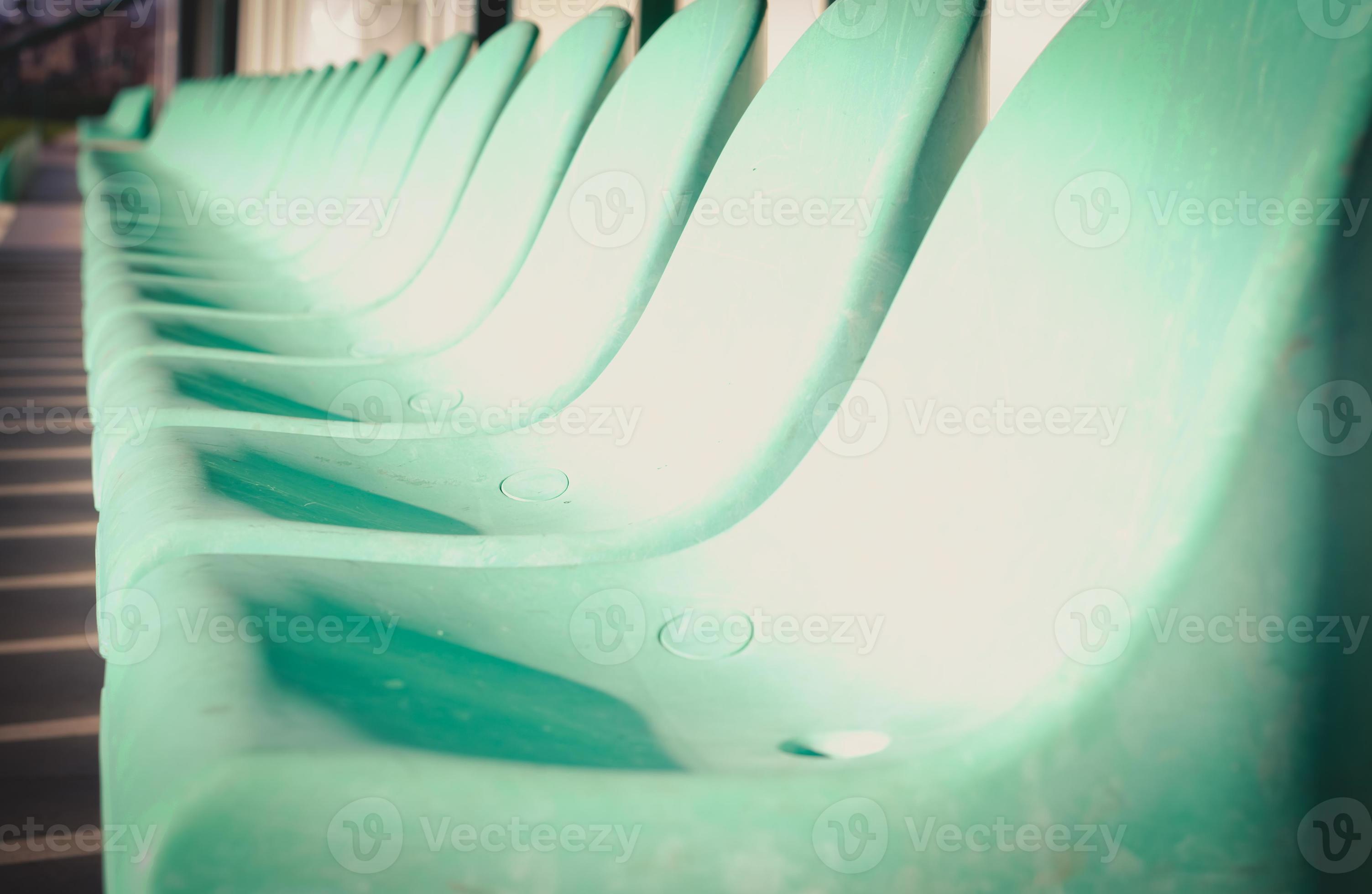 green stadium seats 8999452 Stock Photo at Vecteezy
