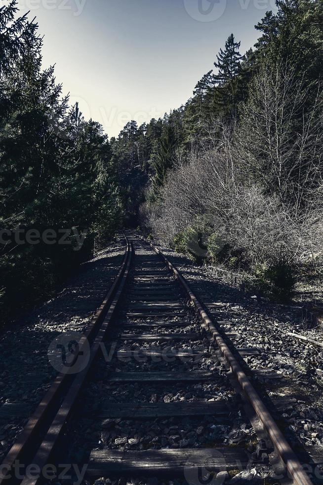 Railroad track in the dark photo