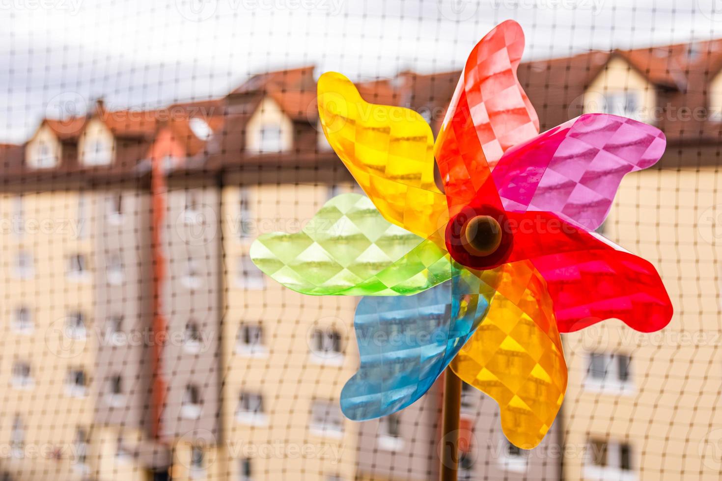 Rainbow colored whirligig or pinwheel photo