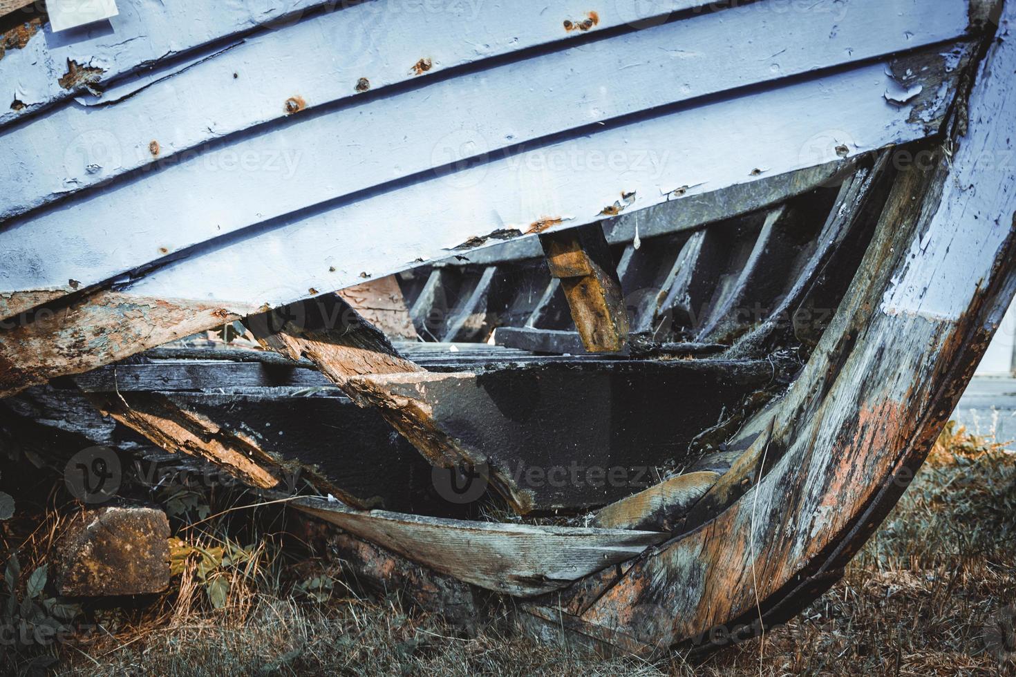 old broken wooden boat photo