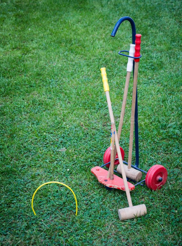 Croquet equipment on lawn photo