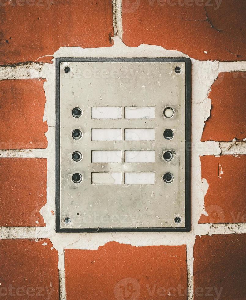 old house door bells on a wall photo
