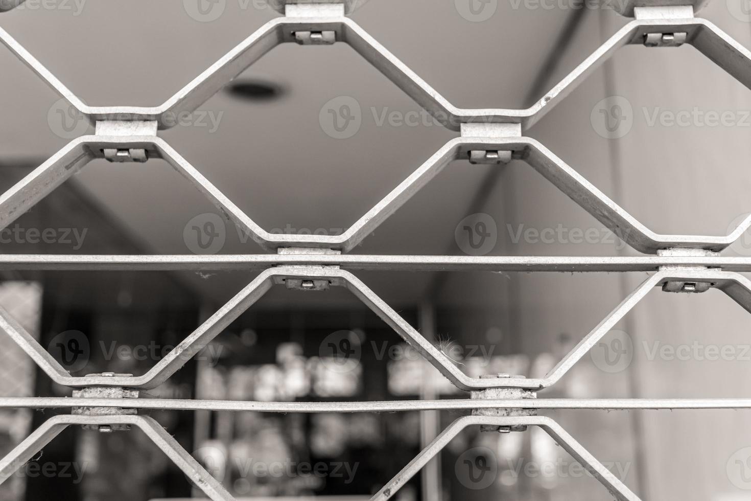 closed store with a grid due to the corona virus photo