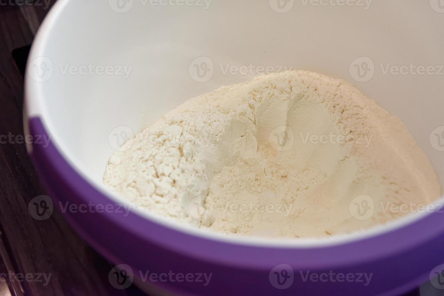 a bowl of flour in closeup photo