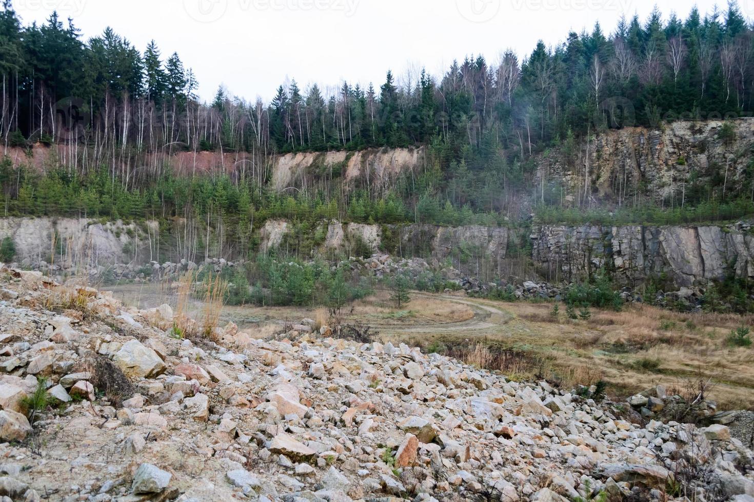 Quarry with forest photo