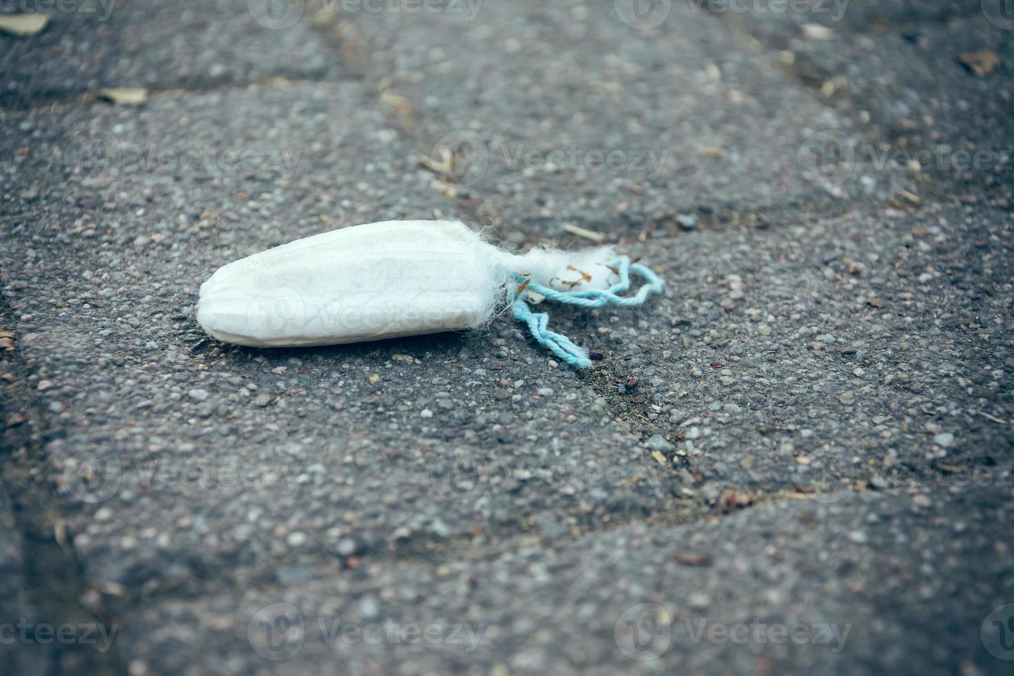 an old tampon on a street photo