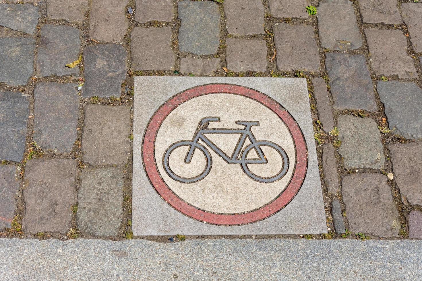 symbol on paving stones forbidden for bicycles photo