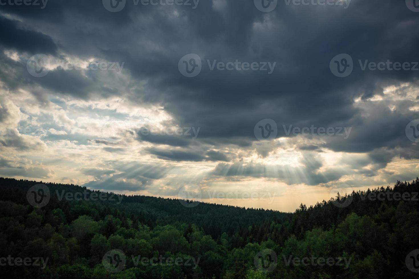 dramatic sky with sunbeams photo
