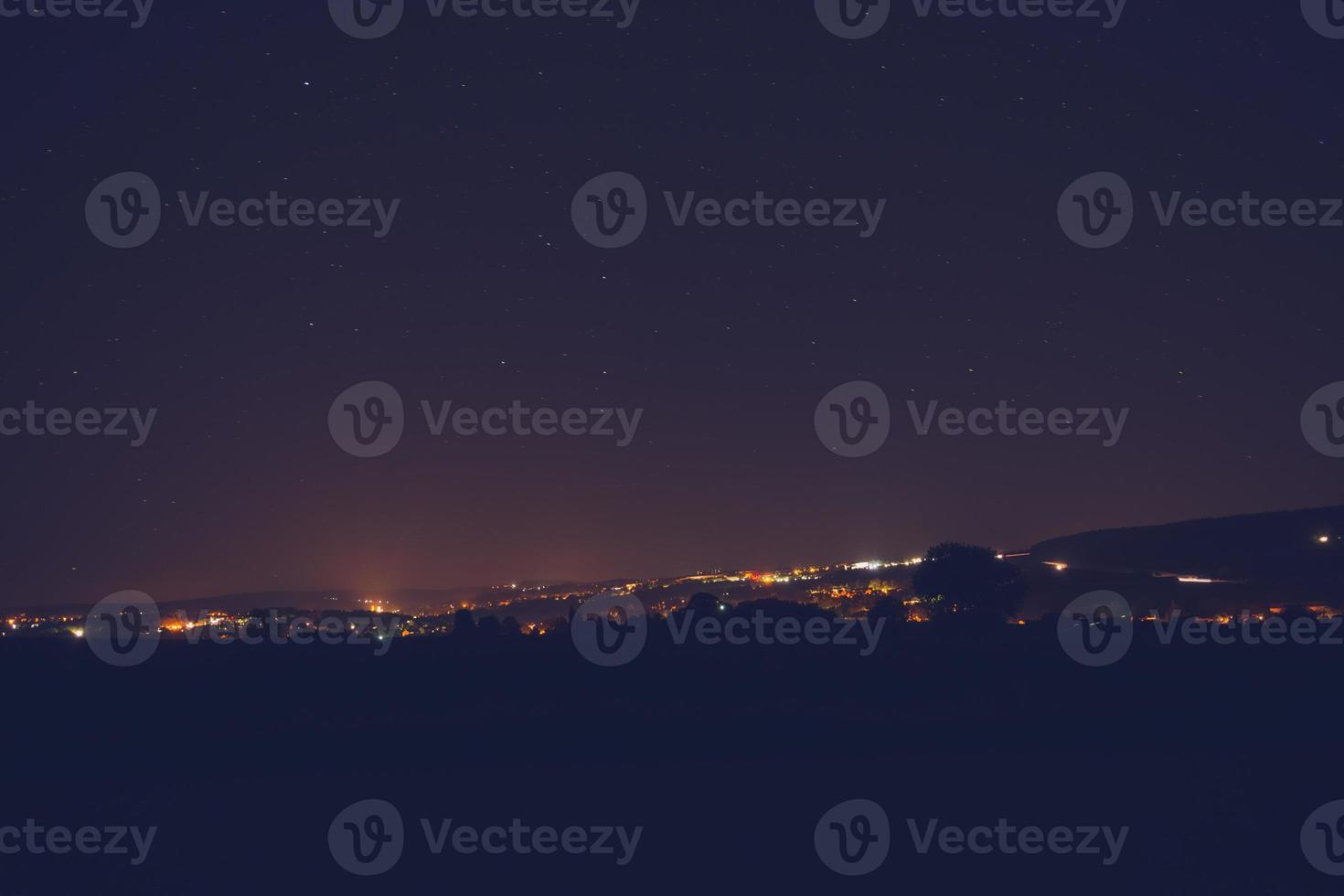 night sky over the city photo