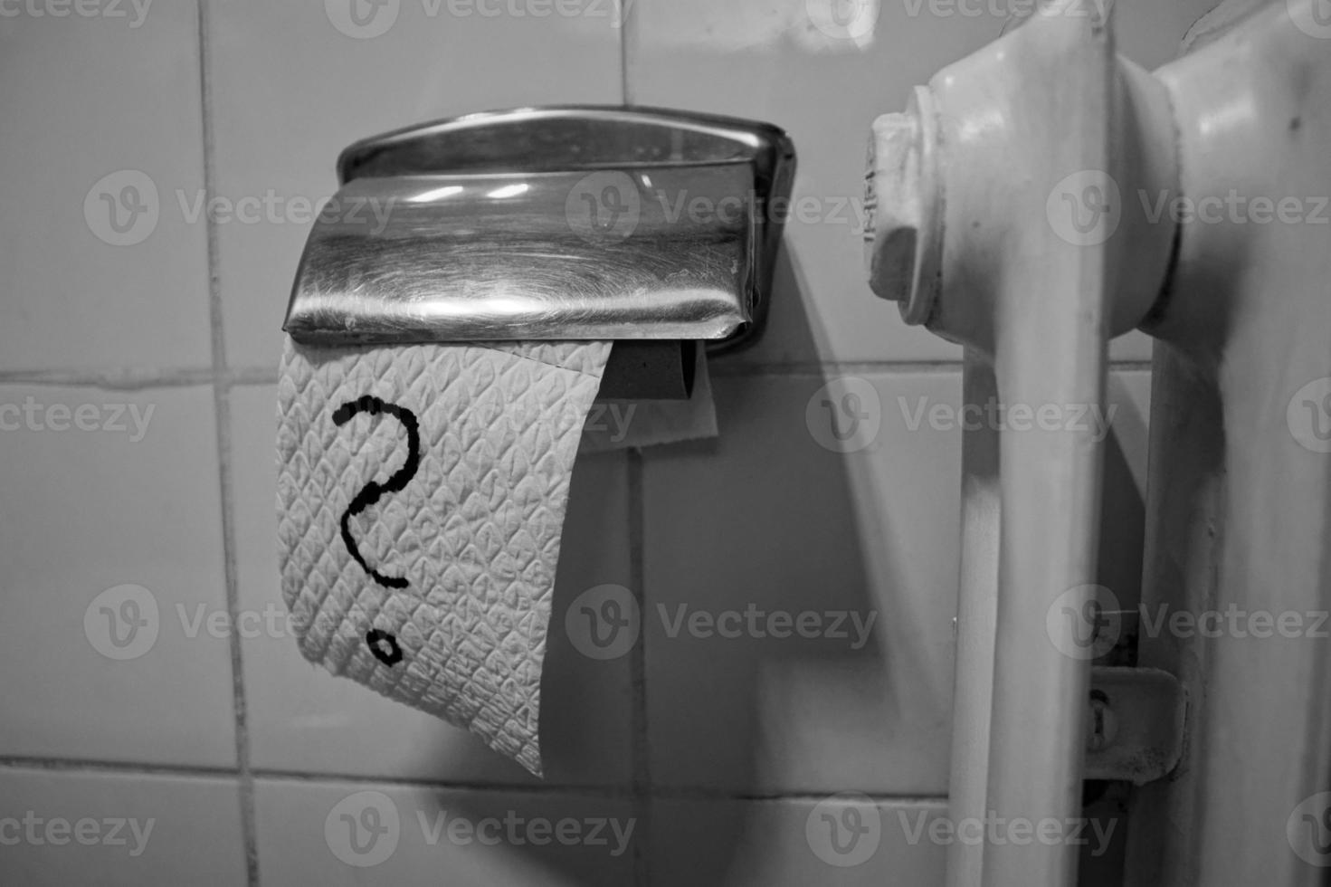 Toilet paper with hand drawn question mark photo