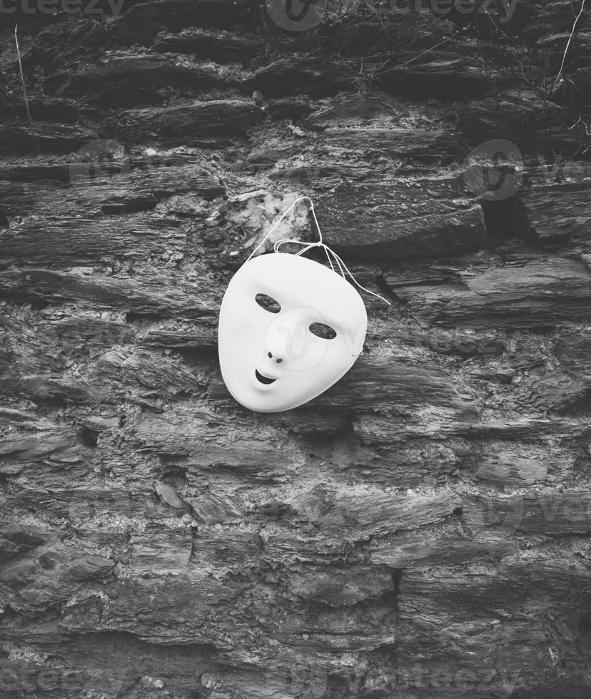 mask on a wall photo